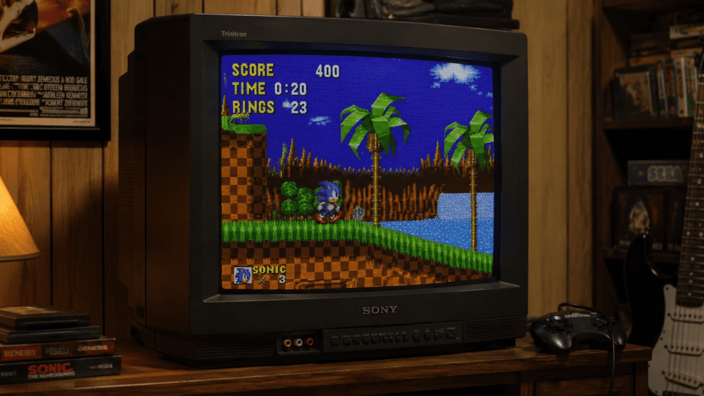A bulky CRT television on a wooden stand displaying a retro video game scene with visible scanlines on the curved glass screen. Warm retro room lighting, wood panelling in the background, a game controller resting beside it