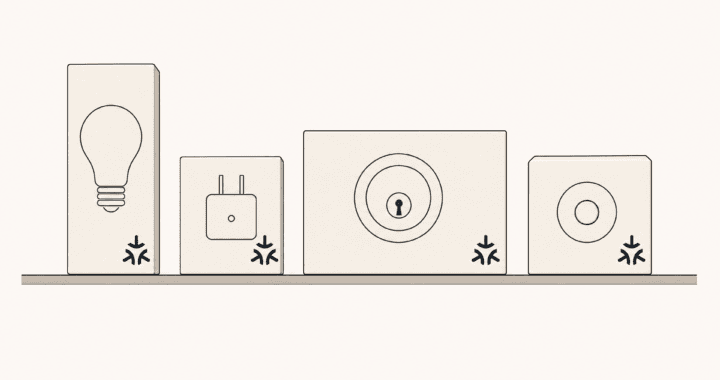 A row of four plain unbranded product boxes (bulb, plug, lock, doorbell), each carrying the same small three-arrow mark in the same corner. No labels at all. Answers your headline literally: the logo is the thing that is suddenly everywhere. Holds up at thumbnail size, and the boxes rather than devices is what separates it from the genre default.